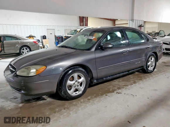 2002 Ford Taurus SES Standard z VIN 1FAFP55U72A161401, wystawiony jako Copart lot #55893125 z przebiegiem 128 258 mil mil oraz Czysty tytuł • Clean title. Historia ofert i sprzedaży dostępna na DreamBid. Obrazek 1.