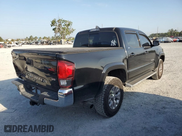 2018 Toyota Tacoma SR5 with VIN 3TMAZ5CN0JM064214, listed as a Copart auction lot 54200645 with 112,336 mi miles and Salvage Title. Bid and sale history available at DreamBid. Image 3.
