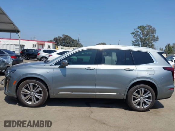 2023 Cadillac XT6 FWD Premium Luxury with VIN 1GYKPCRS6PZ163018, listed as a IAAI auction lot 42437403 with 21,366 mi miles and . Bid and sale history available at DreamBid. Image 15.