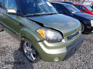 2010 Kia Soul + with VIN KNDJT2A24A7049671, listed as a IAAI auction lot 41736087 with 144,524 mi miles. Bid and sale history available at carsss.com. Image 6.