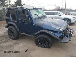 2003 Jeep Wrangler X with VIN 1J4FA39S23P300447, listed as a IAAI auction lot 41791733 with 165,576 mi miles. Bid and sale history available at carsss.com. Image 1.
