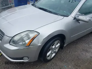 2004 Nissan Maxima SL with VIN 1N4BA41E14C802963, listed as a IAAI auction lot 41852156 with 112,855 mi miles. Bid and sale history available at carsss.com. Image 6.