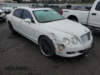 2006 Bentley Flying Spur with VIN SCBBR53W36C037890, listed as a Copart auction lot 43753215 with 61,363 mi miles and Salvage Title. Bid and sale history available at DreamBid. Image 4.