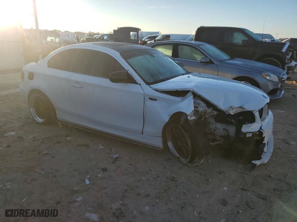 2011 BMW 1 Series 128i with VIN WBAUP9C56BVL90128, listed as a Copart auction lot 86883994 with 149,463 mi miles and Salvage Title. Bid and sale history available at carsss.com. Image 4.
