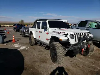 2020 Jeep Gladiator Rubicon with VIN 1C6JJTBG7LL152204, listed as a Copart auction lot 83525554 with 7,030 mi miles and Salvage title. Bid and sale history available at DreamBid. Image 11.
