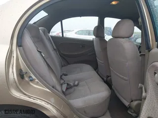 2002 Kia Rio with VIN KNADC123626192611, listed as a IAAI auction lot 41765104 with 62,387 mi miles. Bid and sale history available at carsss.com. Image 8.