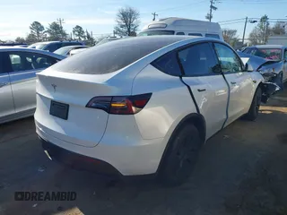 2025 Tesla Model Y Long Range with VIN 7SAYGDED9SA342374, listed as a IAAI auction lot 41663085 with 4,115 mi miles and . Bid and sale history available at DreamBid. Image 4.