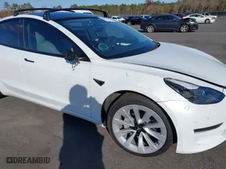 2022 Tesla Model 3 Long Range with VIN 5YJ3E1EB3NF356854, listed as a IAAI auction lot 40948390 with NaN miles. Bid and sale history available at carsss.com. Image 19.