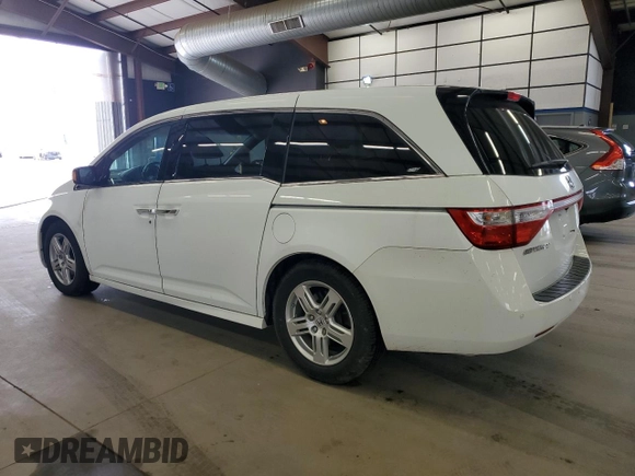 2011 Honda Odyssey Touring Elite with VIN 5FNRL5H90BB083092, listed as a Copart auction lot 54178785 with 135,765 mi miles and Salvage Title. Bid and sale history available at DreamBid. Image 2.