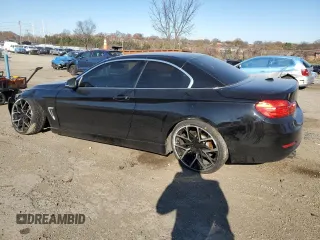 2015 BMW 4 Series 428i with VIN WBA3V7C56FP772739, listed as a Copart auction lot 82468624 with 50,320 mi miles and Salvage Title. Bid and sale history available at carsss.com. Image 2.