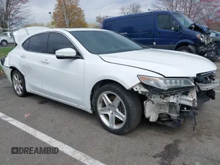 2016 Acura TLX Technology z VIN 19UUB1F56GA013295, wystawiony jako IAAI lot #42011330 z przebiegiem 98 256 mil mil oraz . Historia ofert i sprzedaży dostępna na DreamBid. Obrazek 1.