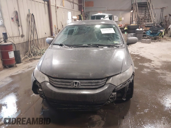2011 Honda Insight with VIN JHMZE2H37BS004281, listed as a IAAI auction lot 41636305 with 273,063 mi miles and . Bid and sale history available at DreamBid. Image 13.