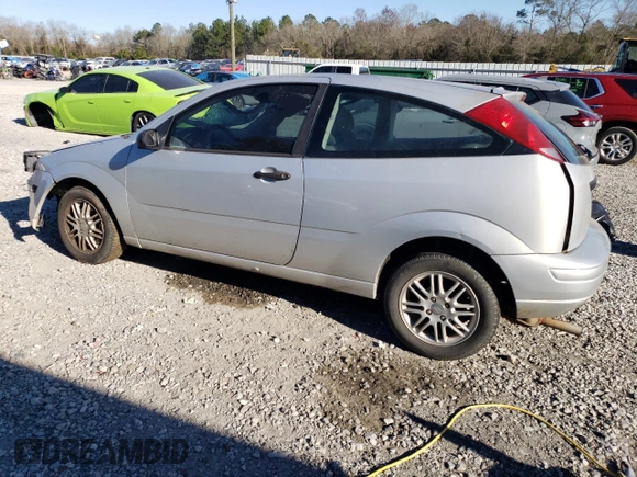 2005 Ford Focus S with VIN 3FAFP31N95R153930, listed as a Copart auction lot 47019315 with 96,985 mi miles and Salvage title. Bid and sale history available at DreamBid. Image 2.