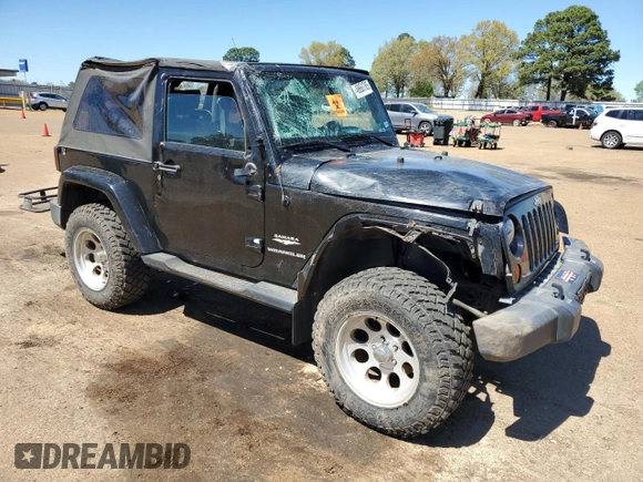 2007 Jeep Wrangler Sahara z VIN 1J4FA54177L183617, wystawiony jako Copart lot #49660785 z przebiegiem 178 846 mil mil oraz Szkoda całkowita • Salvage title. Historia ofert i sprzedaży dostępna na DreamBid. Obrazek 4.