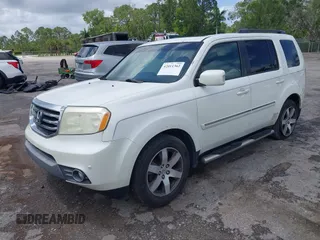 2012 Honda Pilot Touring with VIN 5FNYF3H9XCB035494, listed as a IAAI auction lot 42011362 with 271,887 mi miles and . Bid and sale history available at carsss.com. Image 2.