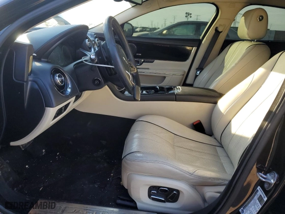 2014 Jaguar XJ with VIN SAJWJ2GD6E8V73491, listed as a Copart auction lot 42472345 with 68,747 mi miles and Salvage Title. Bid and sale history available at carsss.com. Image 7.