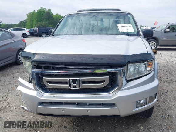 2009 Honda Ridgeline RTL with VIN 2HJYK16539H500986, listed as a IAAI auction lot 42084176 with 161,142 mi miles and . Bid and sale history available at DreamBid. Image 12.