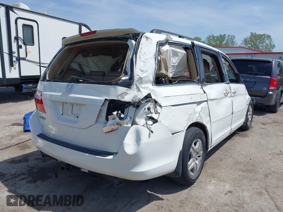 2007 Honda Odyssey EX-L with VIN 5FNRL38617B141003, listed as a IAAI auction lot 39232543 with 195,096 mi miles and . Bid and sale history available at DreamBid. Image 4.