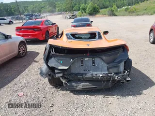 2023 Chevrolet Corvette 1LT z VIN 1G1YA2D42P5116136, wystawiony jako IAAI lot #39475074 z przebiegiem Nie podano mil oraz . Historia ofert i sprzedaży dostępna na DreamBid. Obrazek 16.