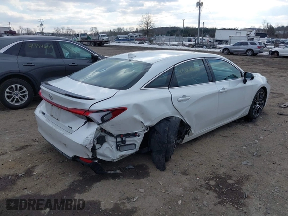 2019 Toyota Avalon XLE with VIN 4T1BZ1FB5KU014903, listed as a IAAI auction lot 41388692 with 100,599 mi miles. Bid and sale history available at carsss.com. Image 6.