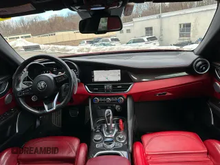 2020 Alfa Romeo Giulia Ti Sport z VIN ZARFAMBN7L7626380, wystawiony jako Copart lot #47583435 z przebiegiem 63 898 mil mil oraz Czysty tytuł • Clean title. Historia ofert i sprzedaży dostępna na DreamBid. Obrazek 7.