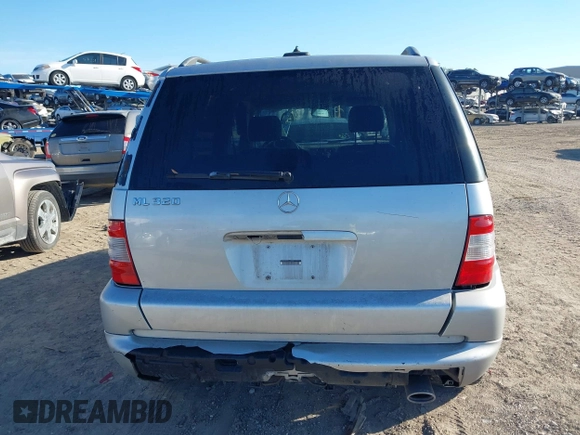 2003 Mercedes-Benz M-Class 3.2L with VIN 4JGAB54E03A383496, listed as a IAAI auction lot 41327756 with 162,973 mi miles. Bid and sale history available at carsss.com. Image 16.