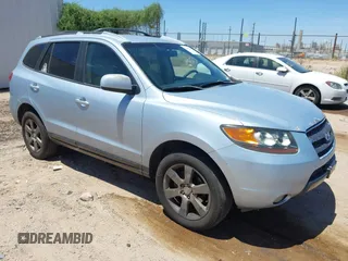 2007 Hyundai Santa Fe SE z VIN 5NMSH73EX7H039691, wystawiony jako IAAI lot #42580347 z przebiegiem 290 681 mil mil oraz . Historia ofert i sprzedaży dostępna na DreamBid. Obrazek 1.
