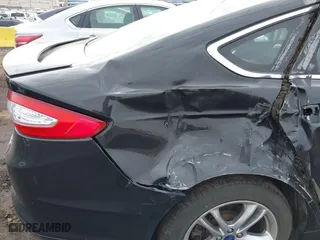2015 Ford Fusion Titanium Hybrid with VIN 3FA6P0RU6FR299374, listed as a IAAI auction lot 41576007 with 191,285 mi miles. Bid and sale history available at carsss.com. Image 20.