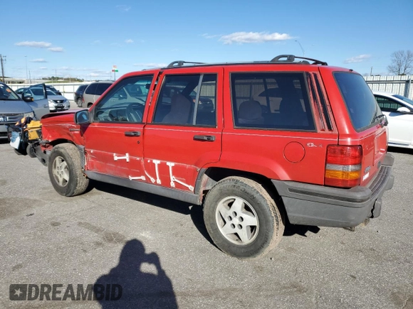 1994 Jeep Grand Cherokee Laredo with VIN 1J4GZ58S8RC254097, listed as a Copart auction lot 47379645 with 240,739 mi miles and Salvage Title. Bid and sale history available at carsss.com. Image 2.