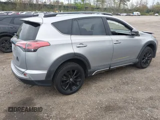 2018 Toyota RAV4 XLE with VIN 2T3RFREV1JW718474, listed as a IAAI auction lot 42144572 with 62,852 mi miles and . Bid and sale history available at DreamBid. Image 4.