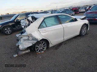 2017 Toyota Camry Hybrid LE with VIN 4T1BD1FK3HU213729, listed as a IAAI auction lot 41556587 with 110,713 mi miles. Bid and sale history available at carsss.com. Image 4.