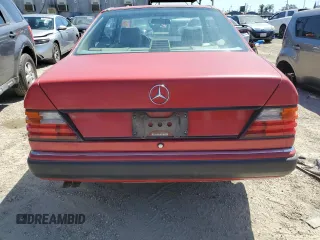 1990 Mercedes-Benz 300 CE with VIN WDBEA51D7LB137591, listed as a Copart auction lot 49811234 with 23,385 mi miles and Salvage Title. Bid and sale history available at carsss.com. Image 6.