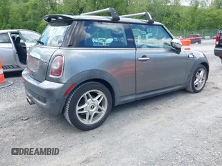 2009 MINI Hardtop S with VIN WMWMF73549TX41034, listed as a IAAI auction lot 42210662 with 108,118 mi miles and . Bid and sale history available at DreamBid. Image 4.