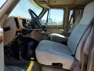 1994 GMC Vandura z VIN 1GDEG25K4RF512695, wystawiony jako Copart lot #63562414 z przebiegiem 171 855 mil mil oraz Szkody całkowita. Historia ofert i sprzedaży dostępna na DreamBid. Obrazek 7.