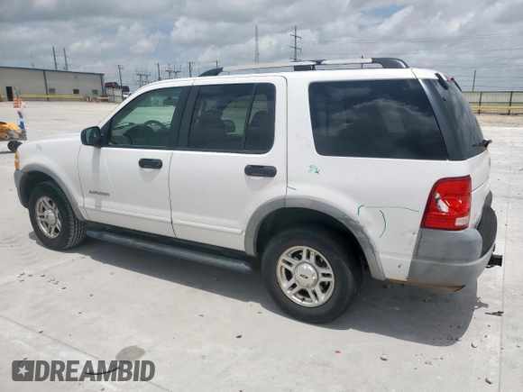 2002 Ford Explorer XLS with VIN 1FMZU62E62UA69368, listed as a Copart auction lot 61571065 with 124,095 mi miles and Salvage title. Bid and sale history available at DreamBid. Image 2.