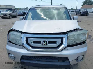 2011 Honda Pilot EX-L with VIN 5FNYF4H54BB099550, listed as a IAAI auction lot 42107327 with 217,050 mi miles and . Bid and sale history available at carsss.com. Image 6.