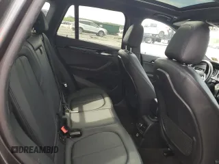 2016 BMW X1 xDrive28i z VIN WBXHT3C37GP888364, wystawiony jako Copart lot #53644975 z przebiegiem 119 725 mil mil oraz Szkoda całkowita • Salvage title. Historia ofert i sprzedaży dostępna na DreamBid. Obrazek 11.