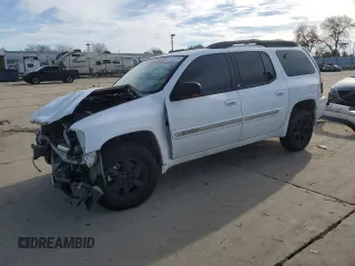 2003 GMC Envoy XL SLE with VIN 1GKET16S532130221, listed as a Copart auction lot 87108784 with 217,821 mi miles and Salvage Title. Bid and sale history available at carsss.com. Image 1.