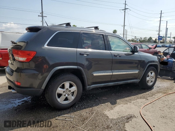 2011 Jeep Grand Cherokee Laredo z VIN 1J4RR4GG2BC518713, wystawiony jako Copart lot #55947995 z przebiegiem 119 783 mil mil oraz Szkoda całkowita • Salvage title. Historia ofert i sprzedaży dostępna na DreamBid. Obrazek 3.