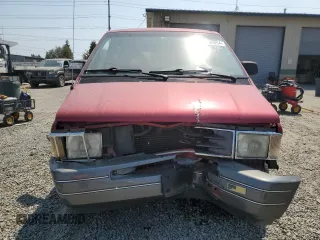 1993 Ford Aerostar with VIN 1FMCA11U0PZB97965, listed as a Copart auction lot 65148054 with 86,569 mi miles and Salvage Title. Bid and sale history available at carsss.com. Image 5.