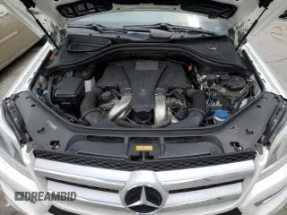 2014 Mercedes-Benz GL 450 z VIN 4JGDF7CE4EA314084, wystawiony jako Copart lot #59593195 z przebiegiem 161 026 mil mil oraz Szkoda całkowita • Salvage title. Historia ofert i sprzedaży dostępna na DreamBid. Obrazek 12.