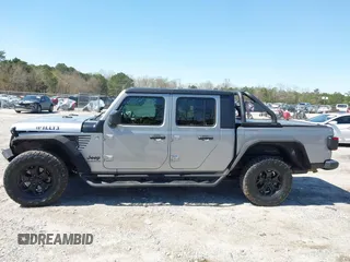 2021 Jeep Gladiator Freedom with VIN 1C6HJTAG3ML540967, listed as a IAAI auction lot 41883858 with 92,287 mi miles and . Bid and sale history available at DreamBid. Image 14.