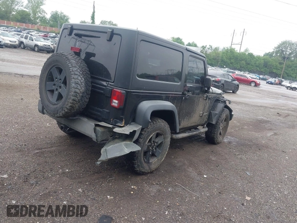 2007 Jeep Wrangler Rubicon with VIN 1J4GA64117L149666, listed as a IAAI auction lot 42252464 with 100,791 mi miles and . Bid and sale history available at DreamBid. Image 4.