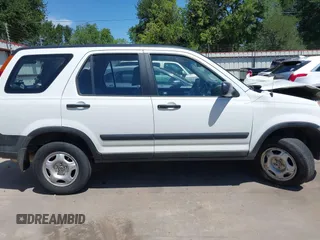 2003 Honda CR-V LX z VIN JHLRD68403C017375, wystawiony jako IAAI lot #42237124 z przebiegiem 172 054 mil mil oraz . Historia ofert i sprzedaży dostępna na DreamBid. Obrazek 13.