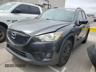 2014 Mazda CX-5 Touring с VIN JM3KE2CY9E0424251, выставлен на аукционе Copart как лот 58479615 с пробегом 189 461 миль миль и Чистый • Clean title. История ставок и продаж доступна на DreamBid. Изображение 1.