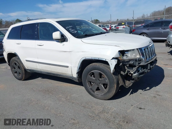 2012 Jeep Grand Cherokee Laredo with VIN 1C4RJFAT4CC229204, listed as a IAAI auction lot 41659491 with 141,143 mi miles. Bid and sale history available at carsss.com. Image 1.