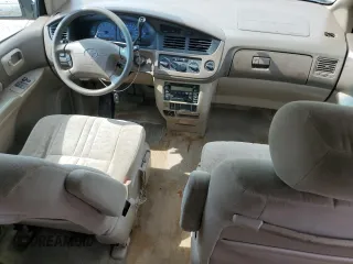 2001 Toyota Sienna LE z VIN 4T3ZF13C61U348612, wystawiony jako Copart lot #58386875 z przebiegiem 142 313 mil mil oraz Tytuł czysty. Historia ofert i sprzedaży dostępna na DreamBid. Obrazek 9.