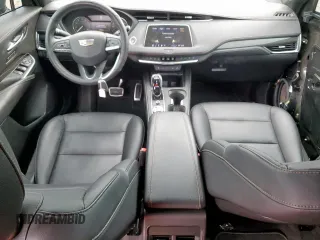 2023 Cadillac XT4 FWD Sport with VIN 1GYFZER42PF111153, listed as a Copart auction lot 60546315 with 41,462 mi miles and Salvage title. Bid and sale history available at DreamBid. Image 8.