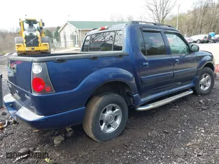 2005 Ford Explorer Sport Trac XLS with VIN 1FMZU77K55UB60334, listed as a IAAI auction lot 41984083 with 1 mi miles. Bid and sale history available at carsss.com. Image 4.