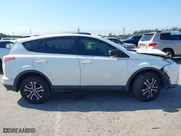 2017 Toyota RAV4 LE with VIN JTMZFREV7HJ143483, listed as a IAAI auction lot 41804683 with 129,319 mi miles. Bid and sale history available at carsss.com. Image 13.